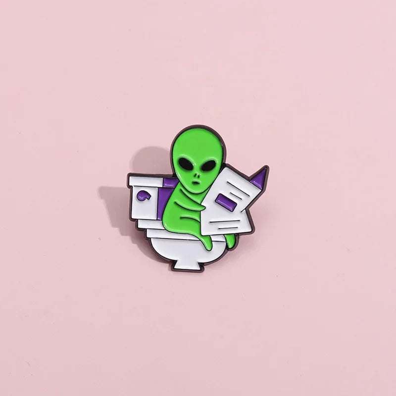 ET Aliens reading newspapers while sitting on the toilet