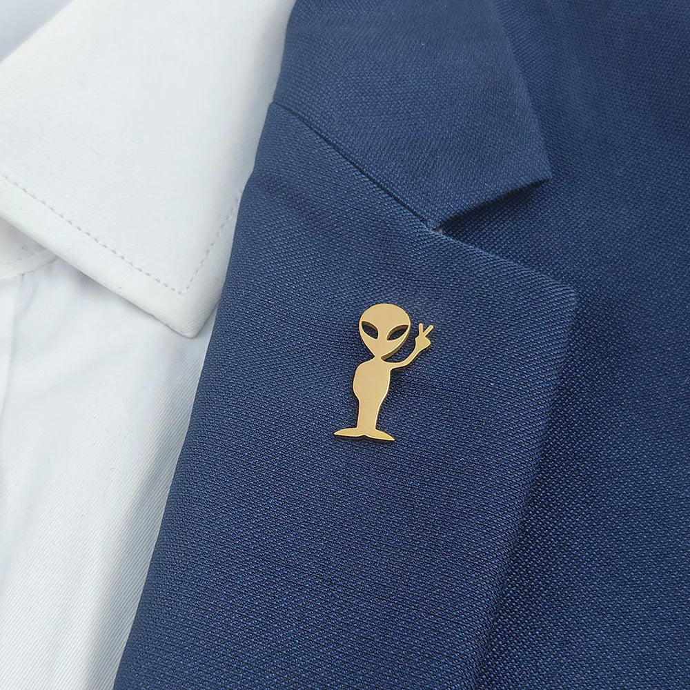 Cartoon alien gold-plated badge