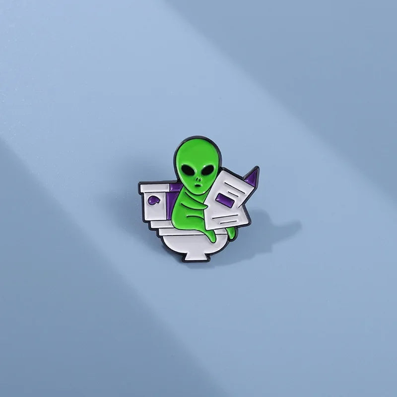ET Aliens reading newspapers while sitting on the toilet