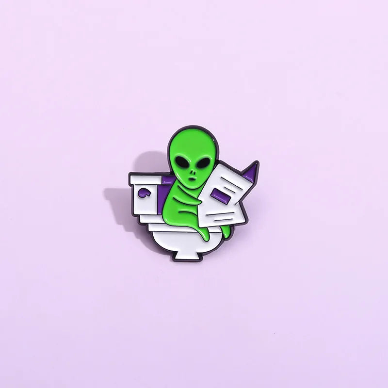 ET Aliens reading newspapers while sitting on the toilet