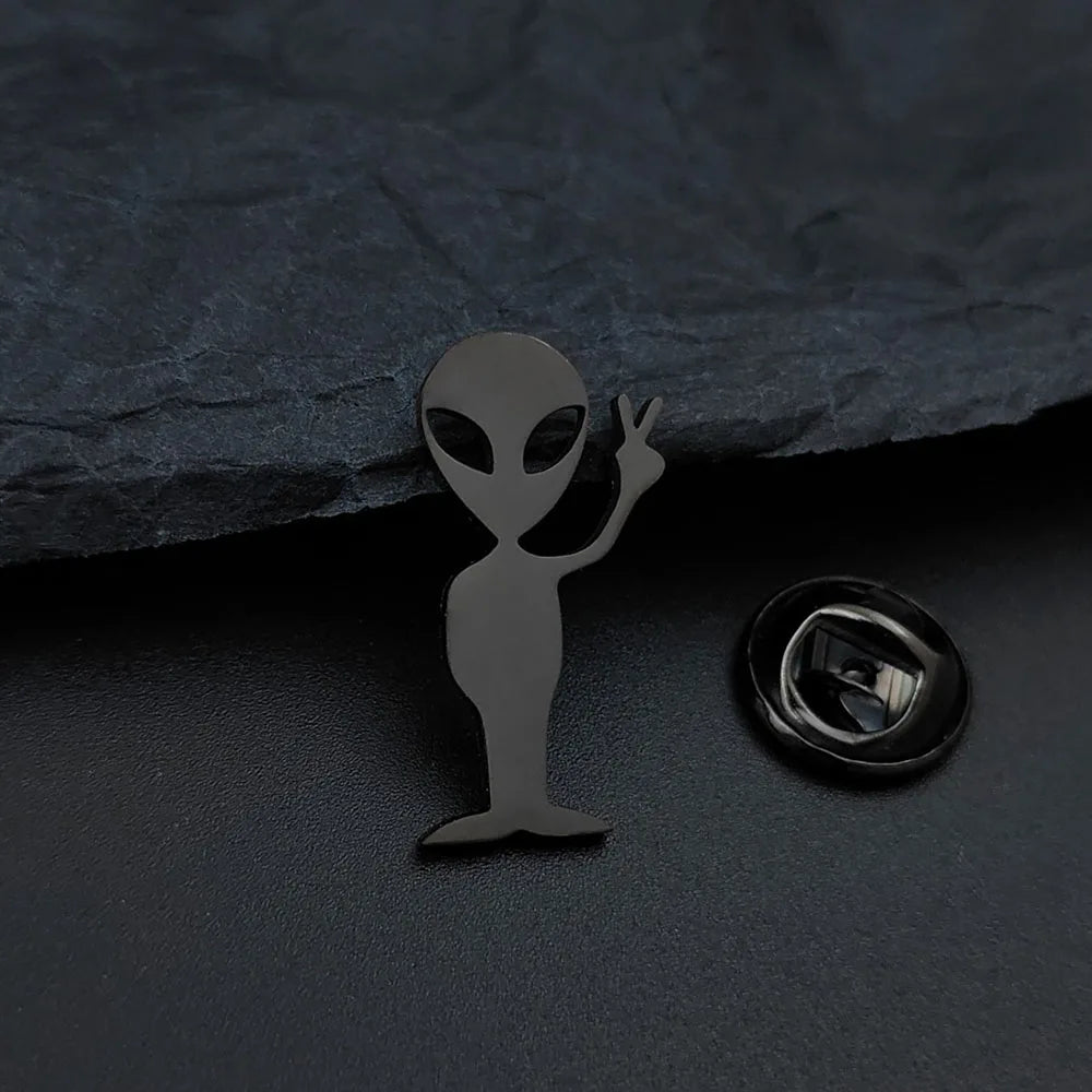 Cartoon alien gold-plated badge